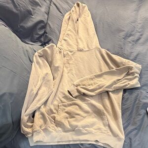 Cream Hoodie with Front Pocket fear of god essentials. Marked M but spacious